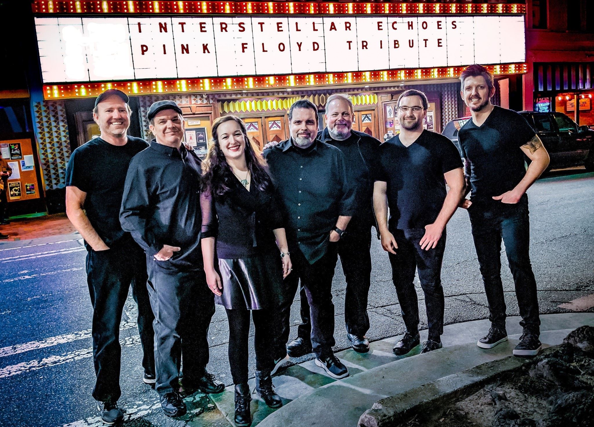 Interstellar Echoes band group in front of the Georgia Theatre